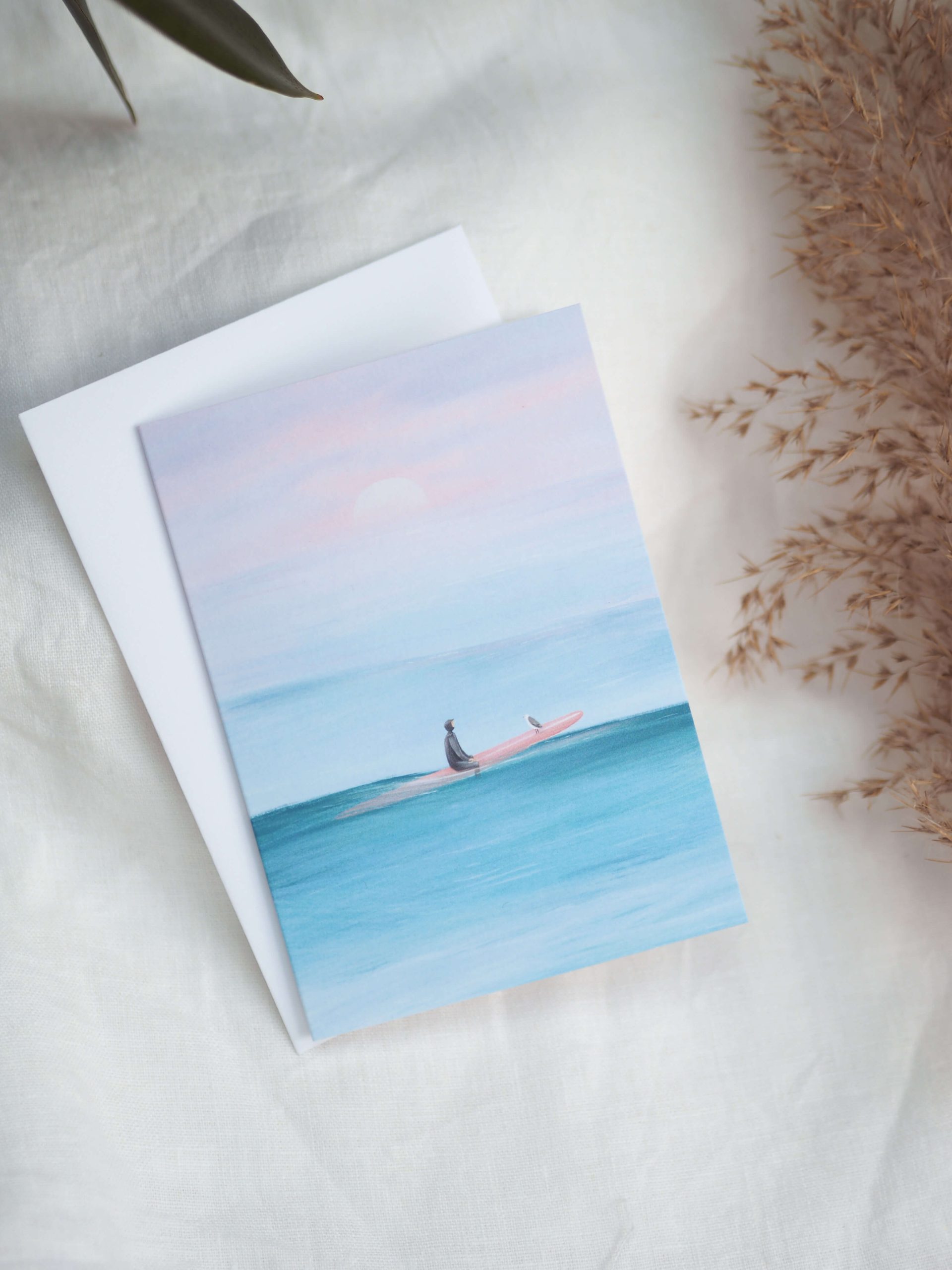 illustrated greeting card of a surfer and seagull 